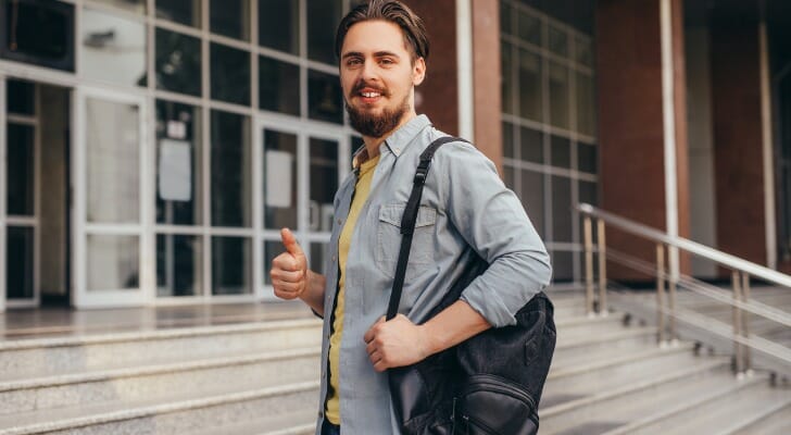 Financial aid advisor arrives at his university office