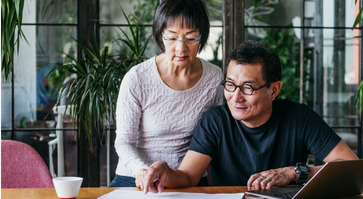 Mature couple reviews their vesting schedule