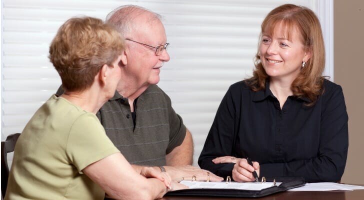 Older couple working with a financial advisor on their estate plan