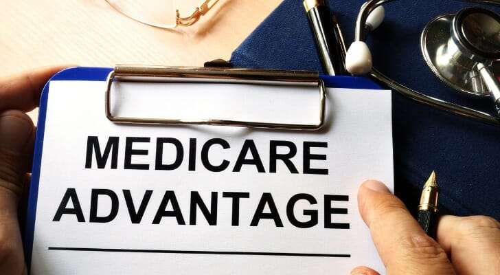 Medicare Advantage forms in a clipboard