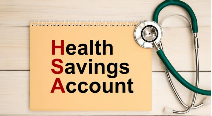 "Health Savings Account" written on notebook cover