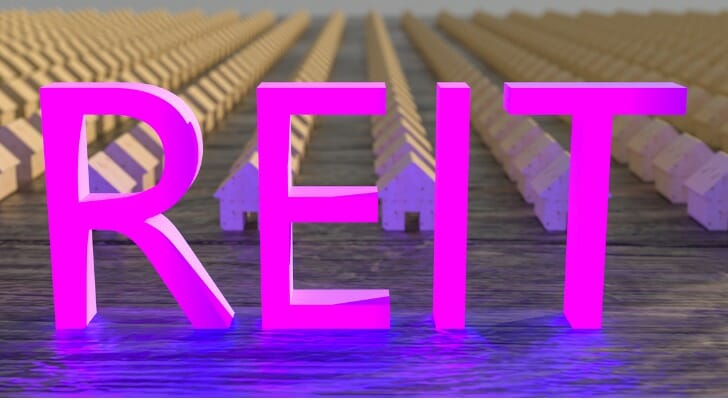 REIT in pink letters