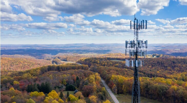 Image shows a cell phone tower in a rural area. The infrastructure bill will allocate $65 billion to expanding access to high-speed internet. 