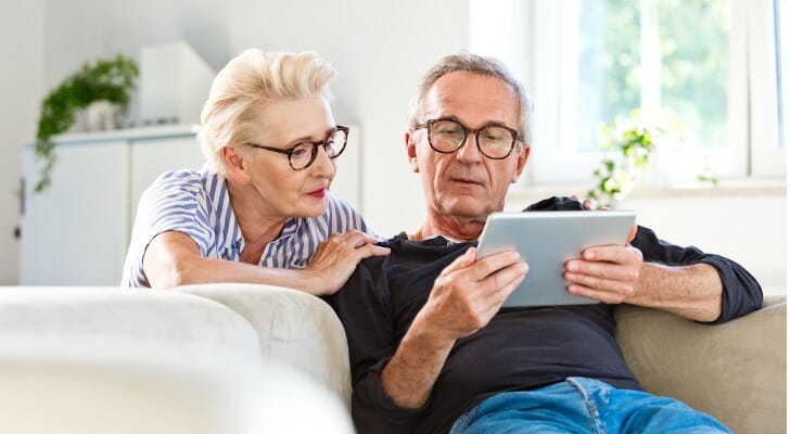 A couple looks over their retirement savings. A recent survey found that Americans believe they need $1.9 million saved by retirement.