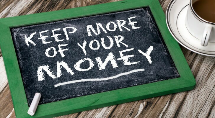 "KEEP MORE OF YOUR MONEY" written on a chalk board