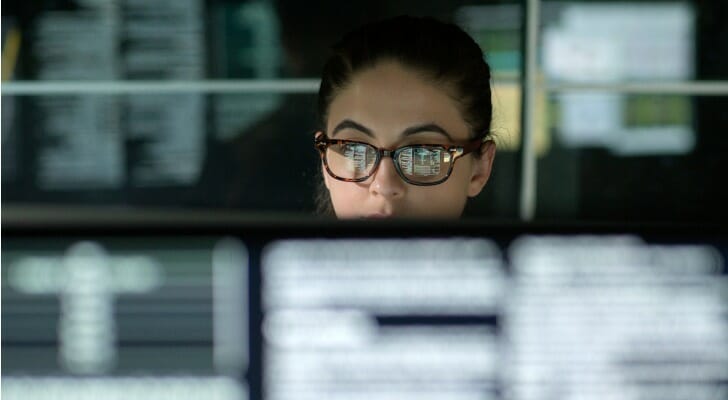 Female banker accesses the money market