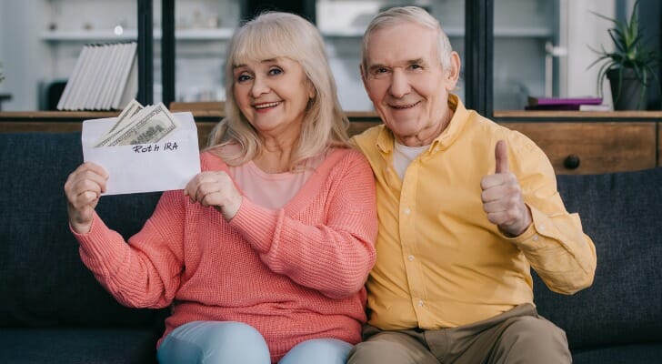 Retired couple with cash from their Roth IRA