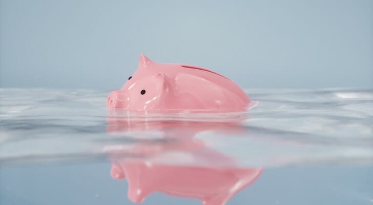 Sinking piggy bank