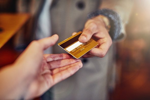 Should You Sign the Back of Your Credit Card? - SmartAsset