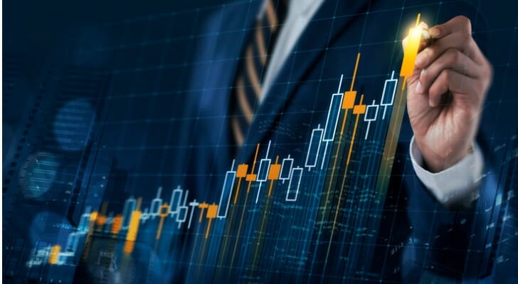 Man with candlestick chart