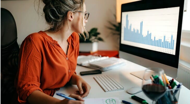 Money manager checks an index fund