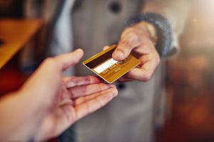 Should You Sign the Back of Your Credit Card? - SmartAsset