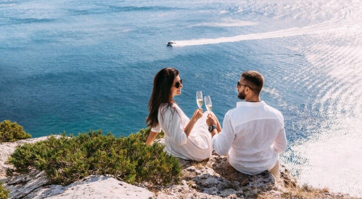 A couple drinking champagne with a great view
