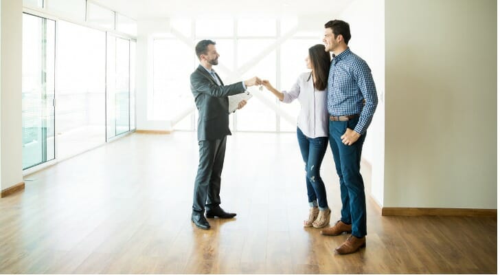 How do real estate agents get paid?