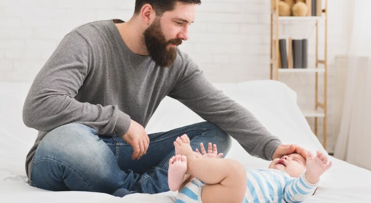 Father watches his baby