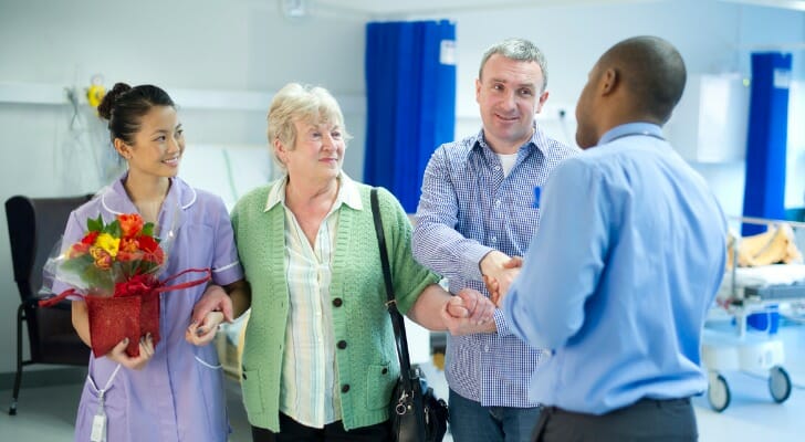 A woman is discharged from the hospital