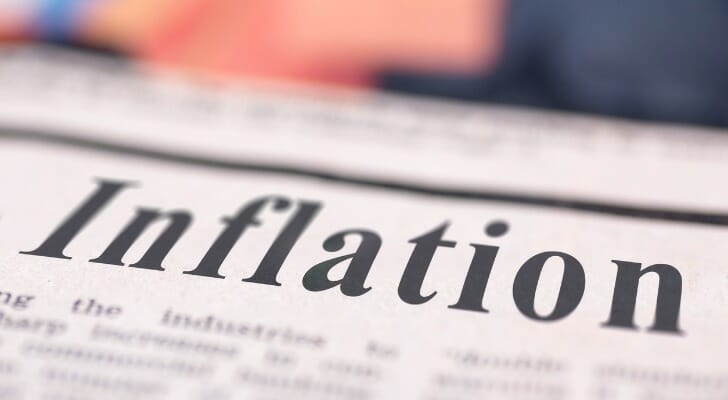 Image shows a newspaper front page with the headline 'Inflation.