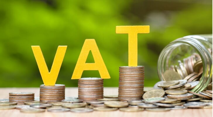 "VAT" on piles of coins