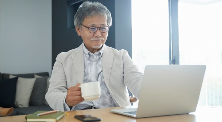 Japanese man using an online trading platform