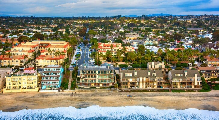 Image shows an aerial view of a shoreline in San Diego, California. SmartAsset analyzed data to conduct its latest study on the hardest places to buy a home.