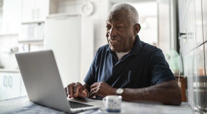 Senior African-American man on his PC