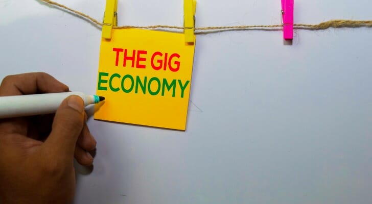 A sign that says, "The Gig Economy"