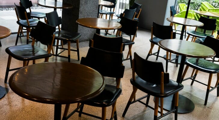 Empty chairs in a cafe represent the need for Oregon coronavirus relief.