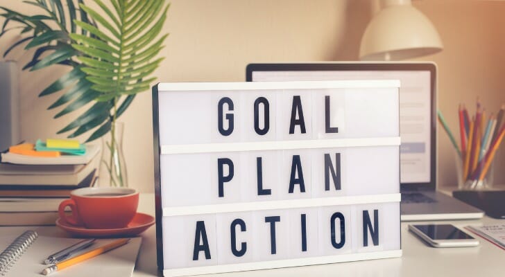 A sign that says, "GOAL PLAN ACTION"